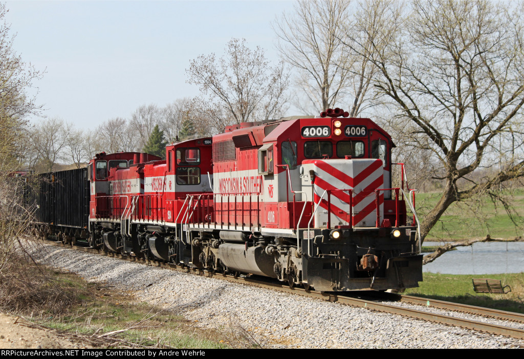 WSOR 4006 leads T010 a few miles out of the Ackerville yard